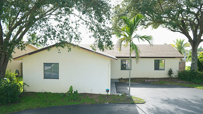 Image of a home in Sunrise Florida with a new shingle roof