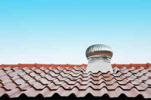 air vent on the red roof outdoor (roof, ventilation, roofing)