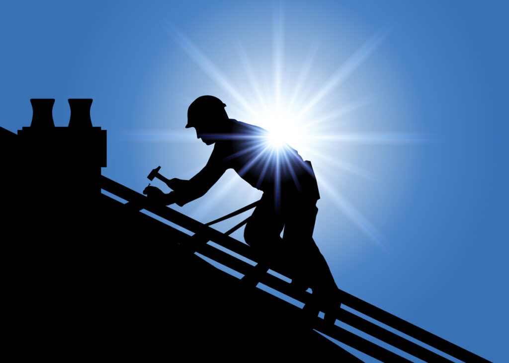 roofing expert working on the roof