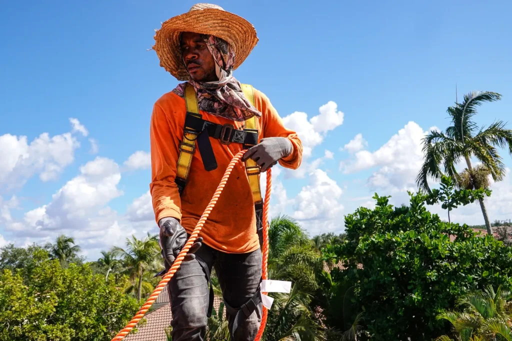 Tiger Team Roofing technician working on a roof replacement in Fort Lauderdale